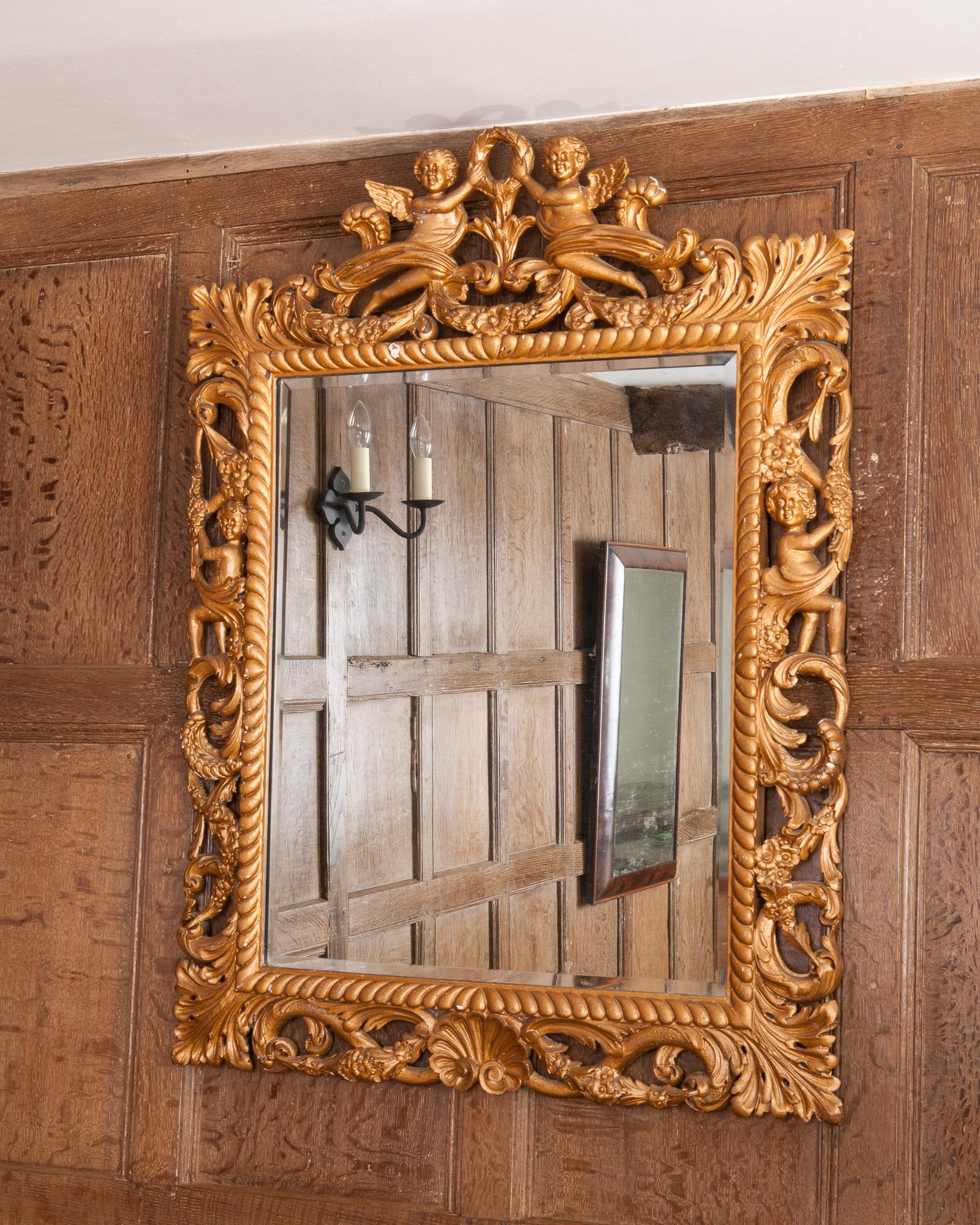 Charles II carved gilt wood mirror