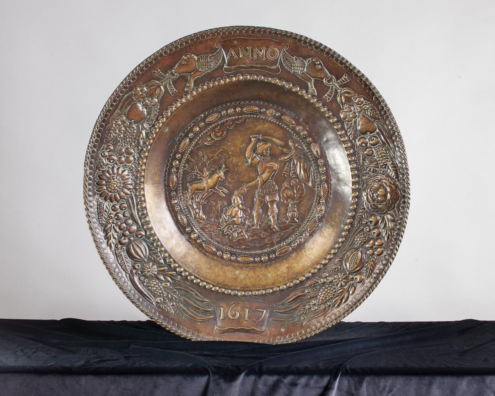 Large dated 17th century brass dish