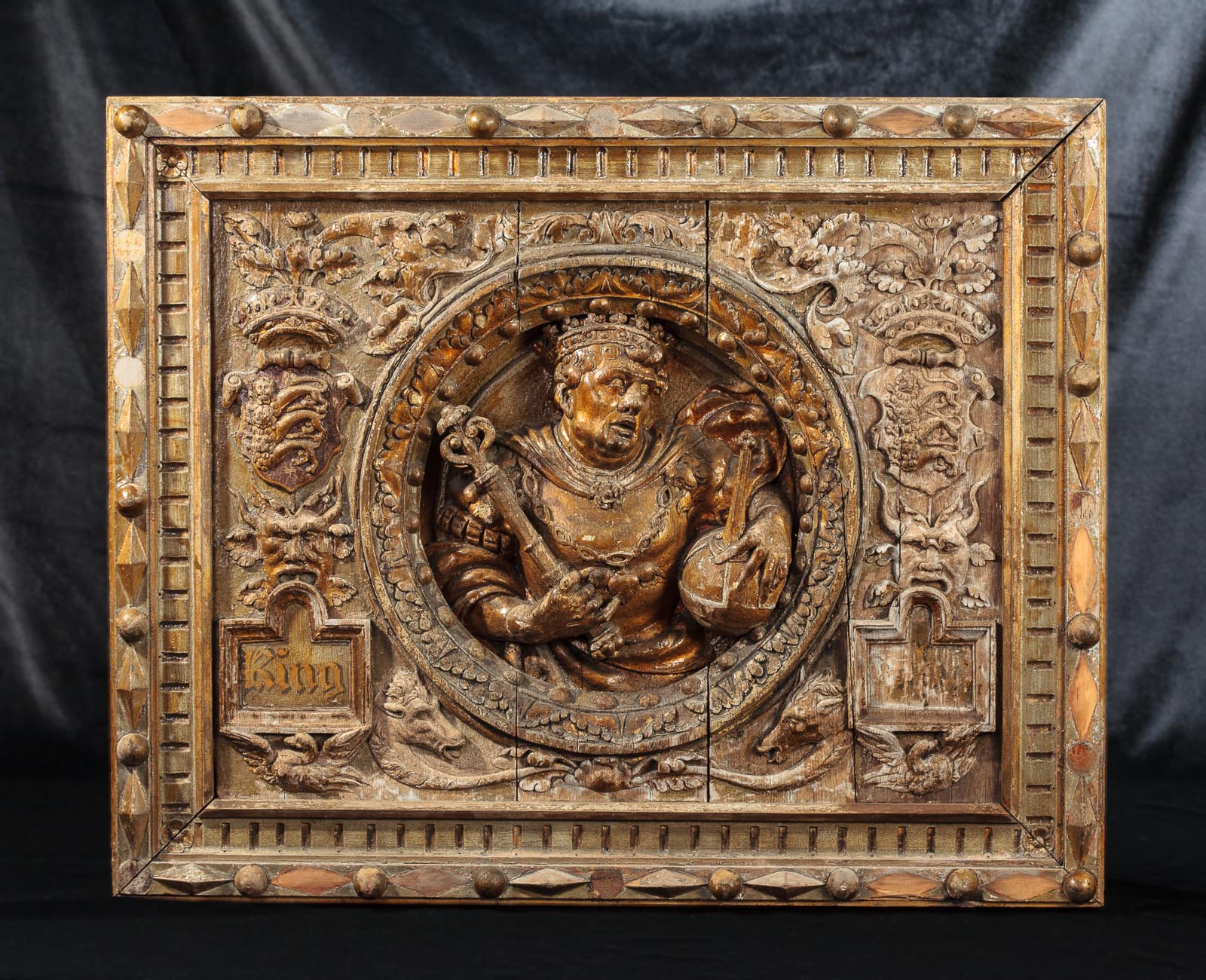 Henry VIII parcel gilt carved oak panel