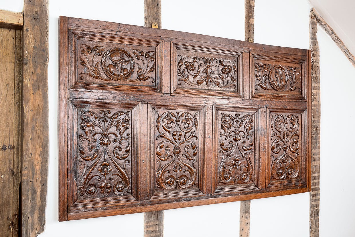 Henry VIII carved oak panelling