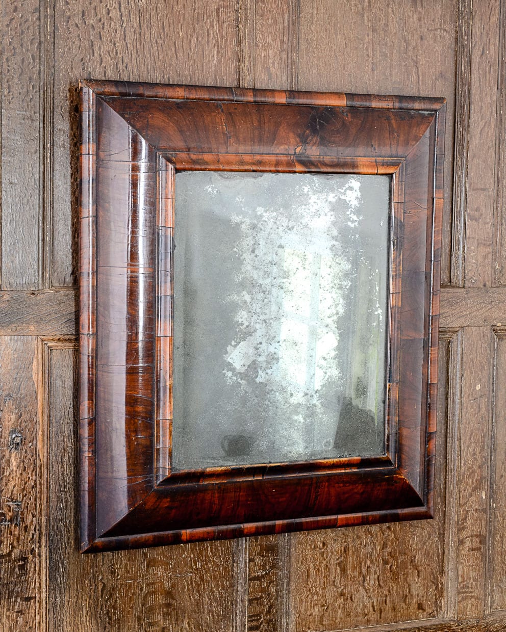 Charles II walnut cushion mirror