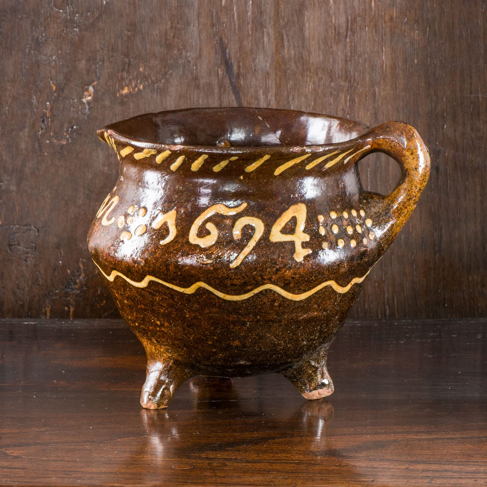 Dated 1694 slipware cooking pot