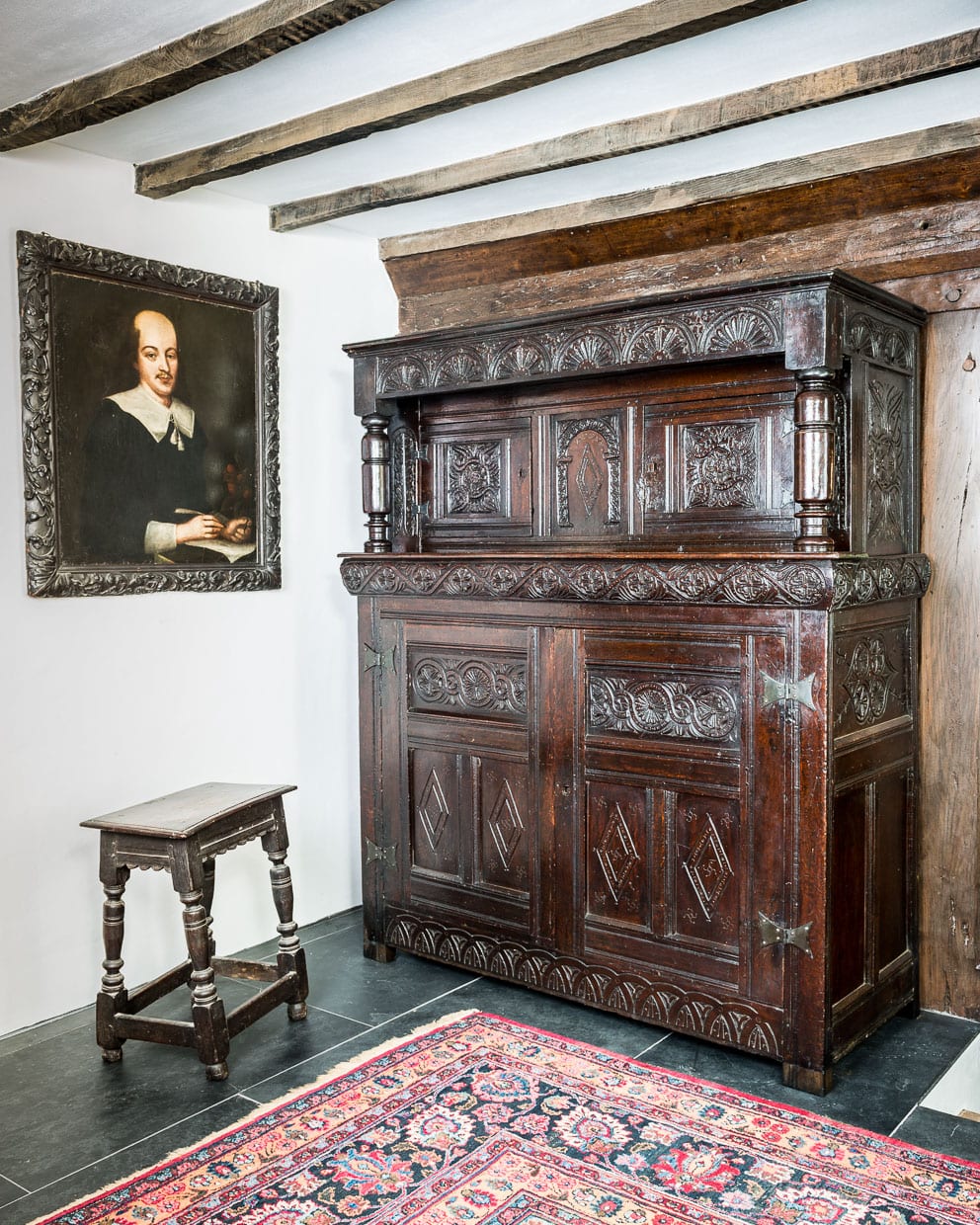Exeter carved oak press cupboard