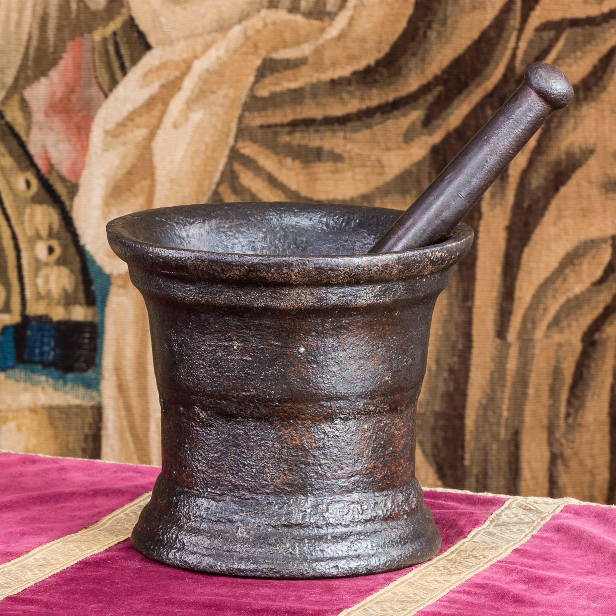 17th century iron pestle and mortar