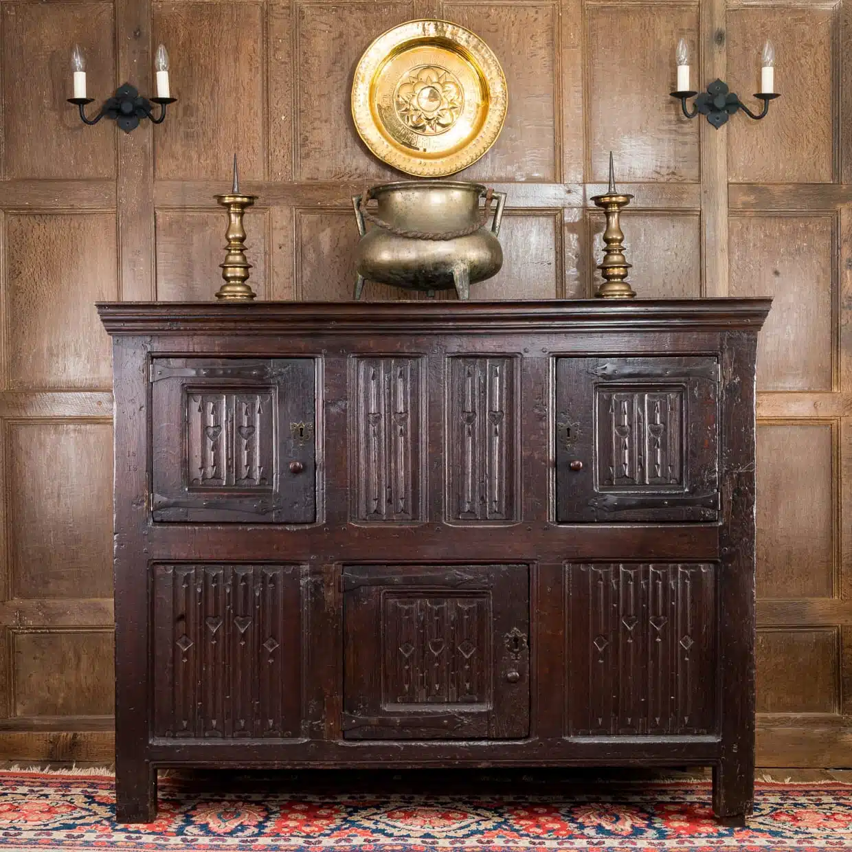 Tudor linenfold oak cupboard