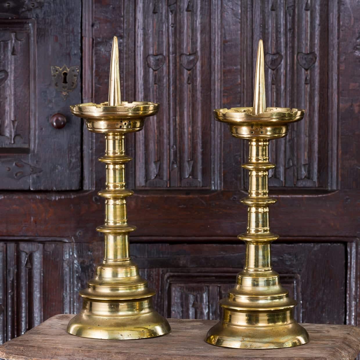 Pair of Gothic pricket candlesticks