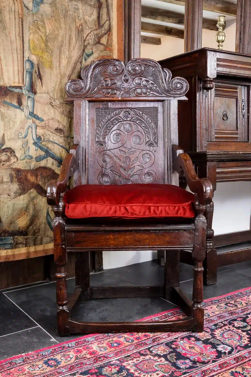 Charles II carved oak armchair