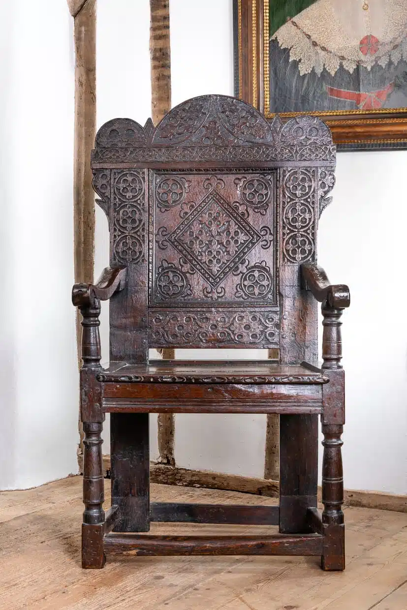 Charles II carved oak armchair