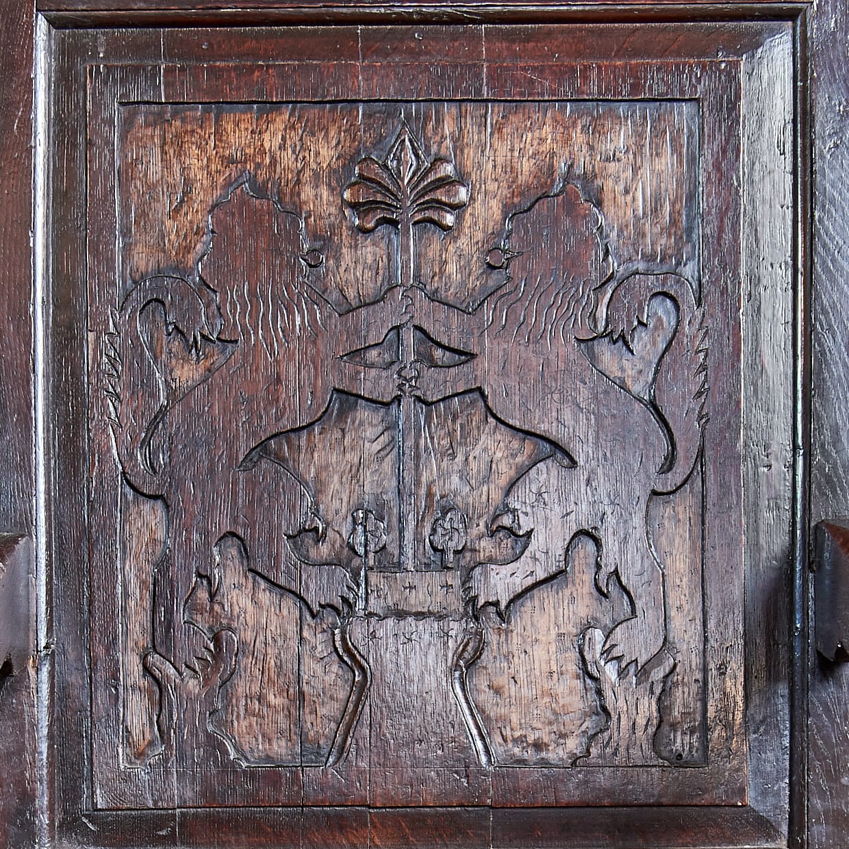Charles II Heraldic carved oak armchair