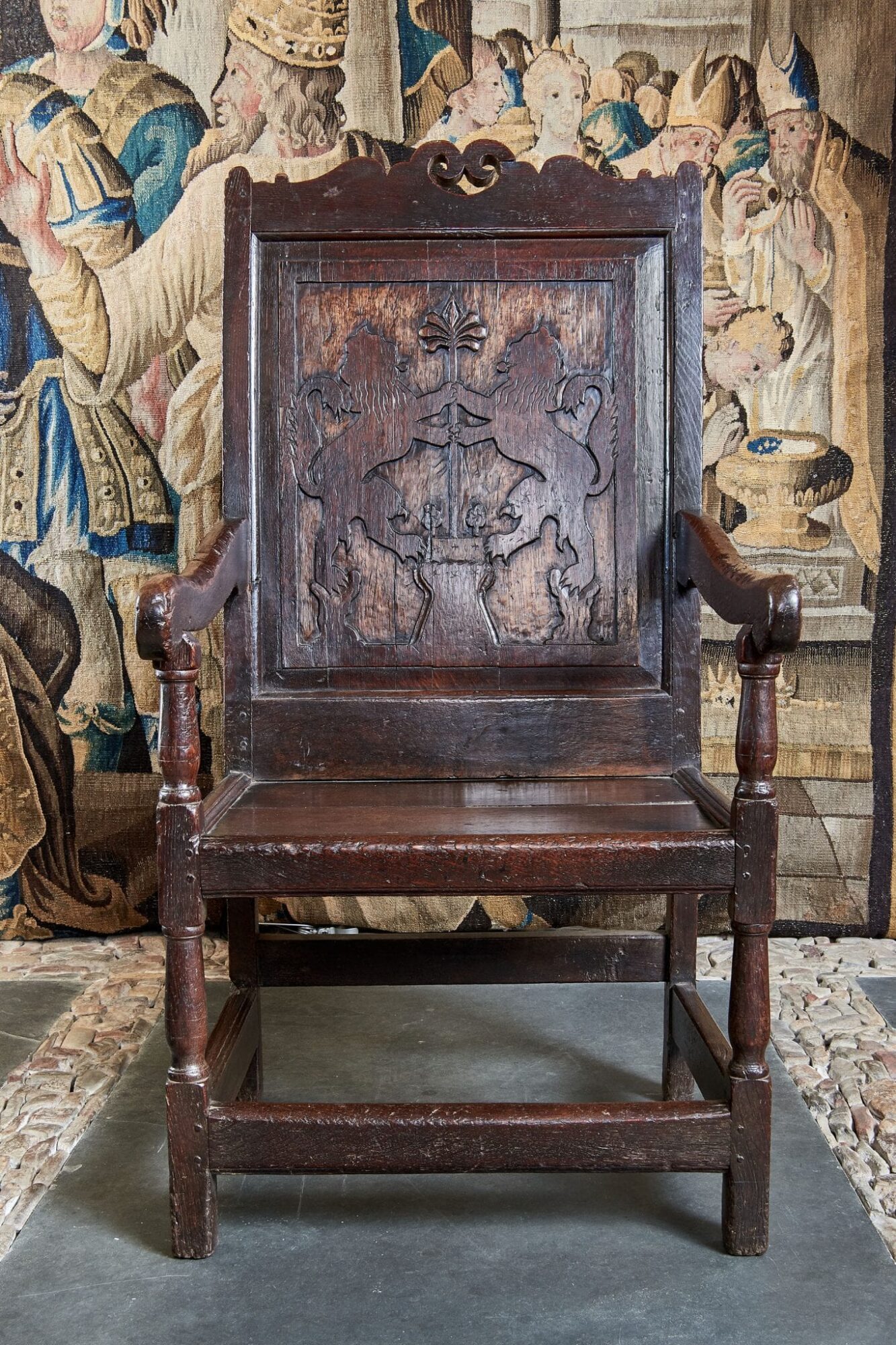 Charles II Heraldic carved oak armchair