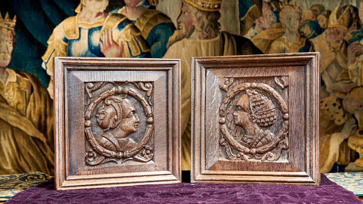 Pair of portrait carved panels