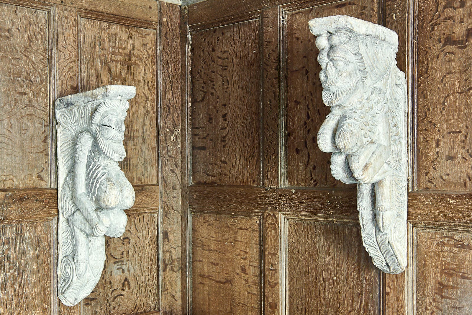 Pair of Elizabeth I oak Satyrs