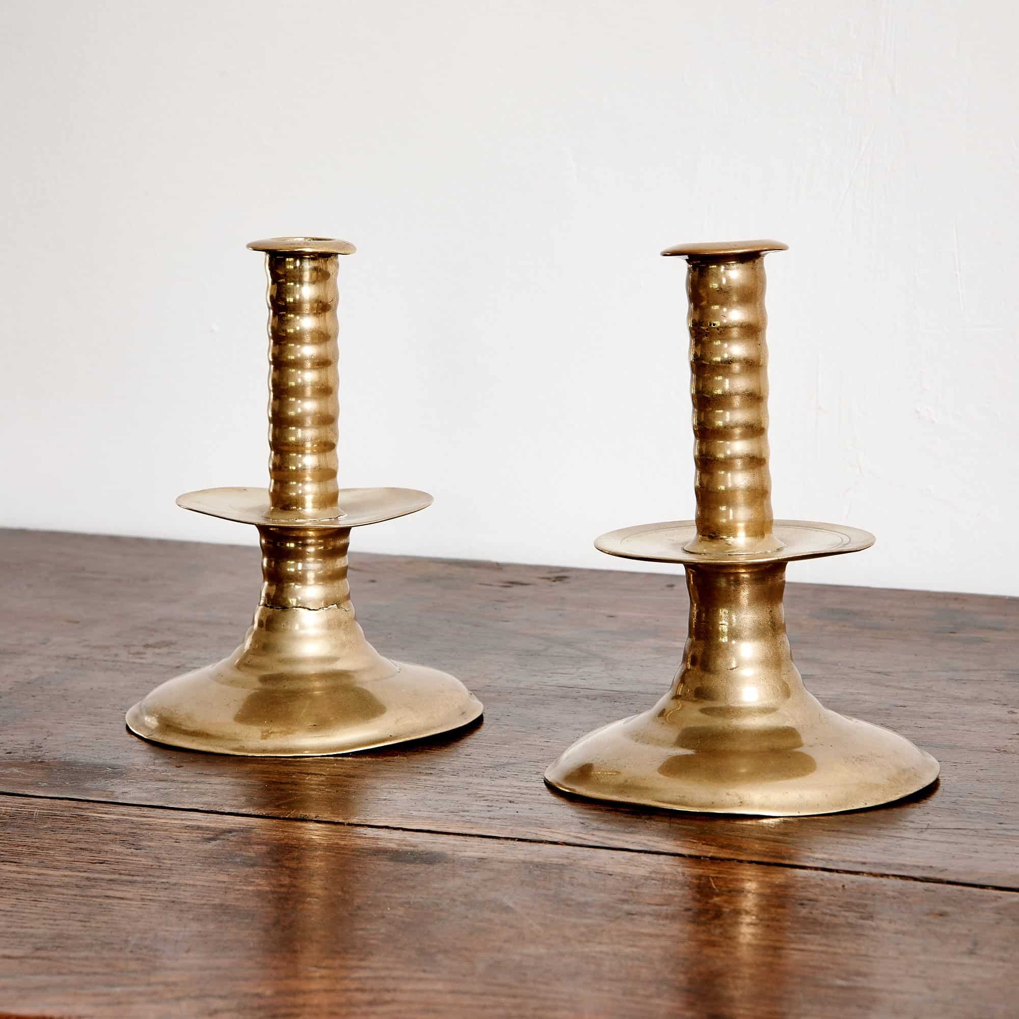 Charles II brass trumpet candlesticks