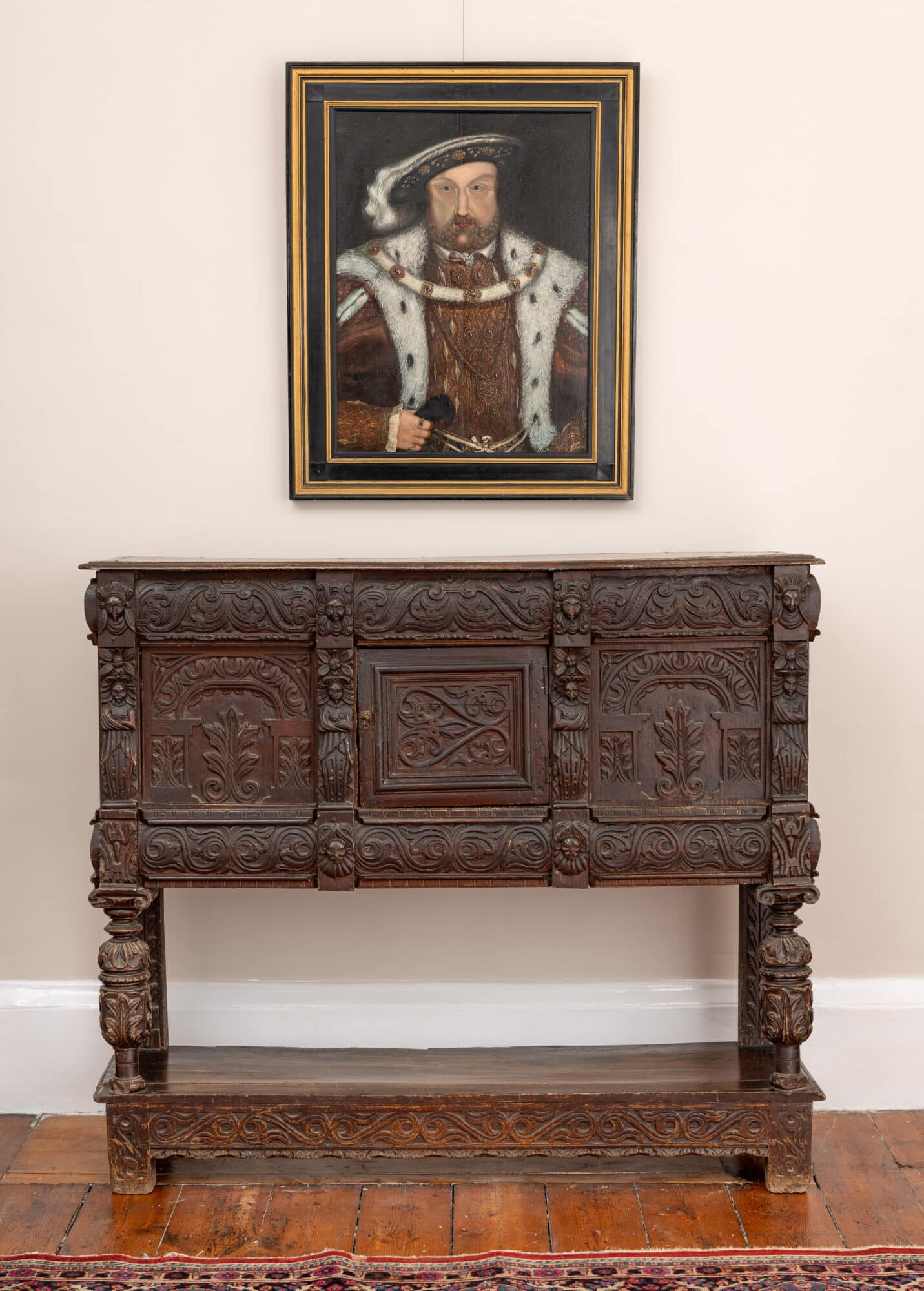A Late Elizabeth I Carved Oak Cupboard