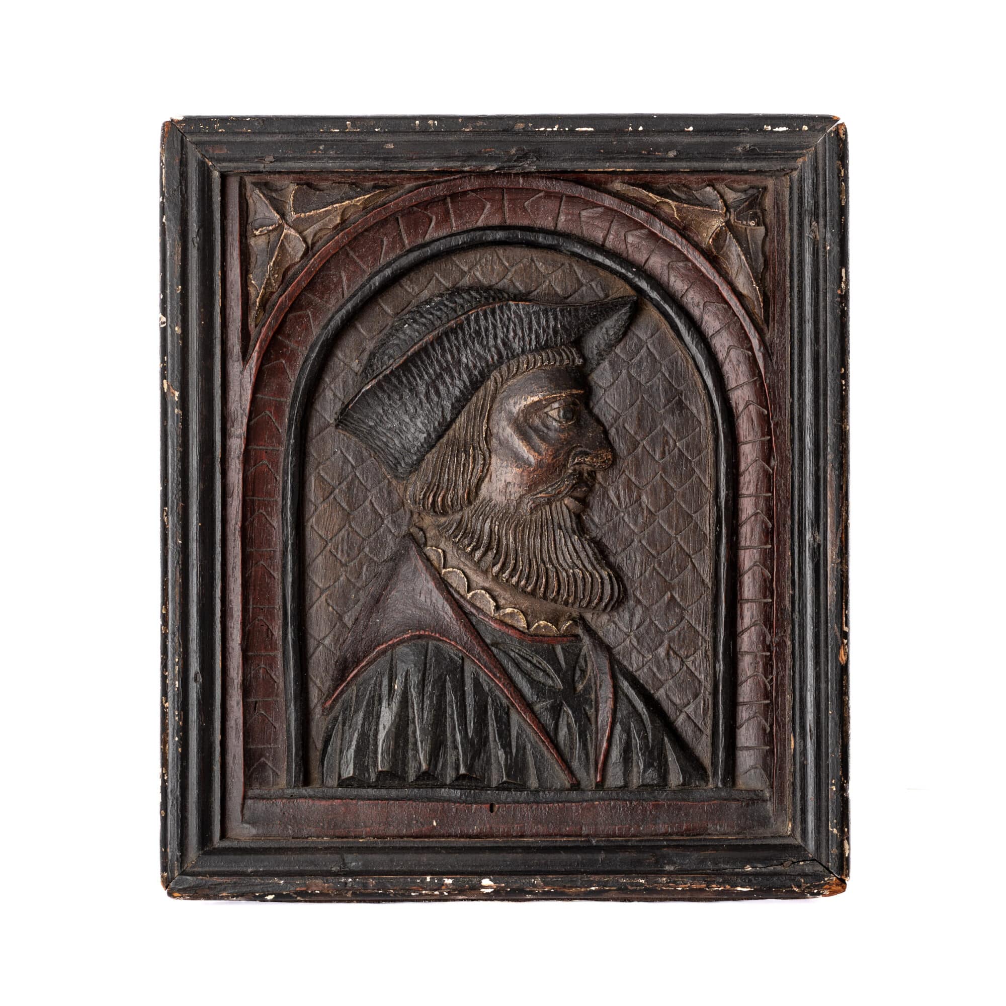 Henry VIII period carved oak portrait panel of a bearded man