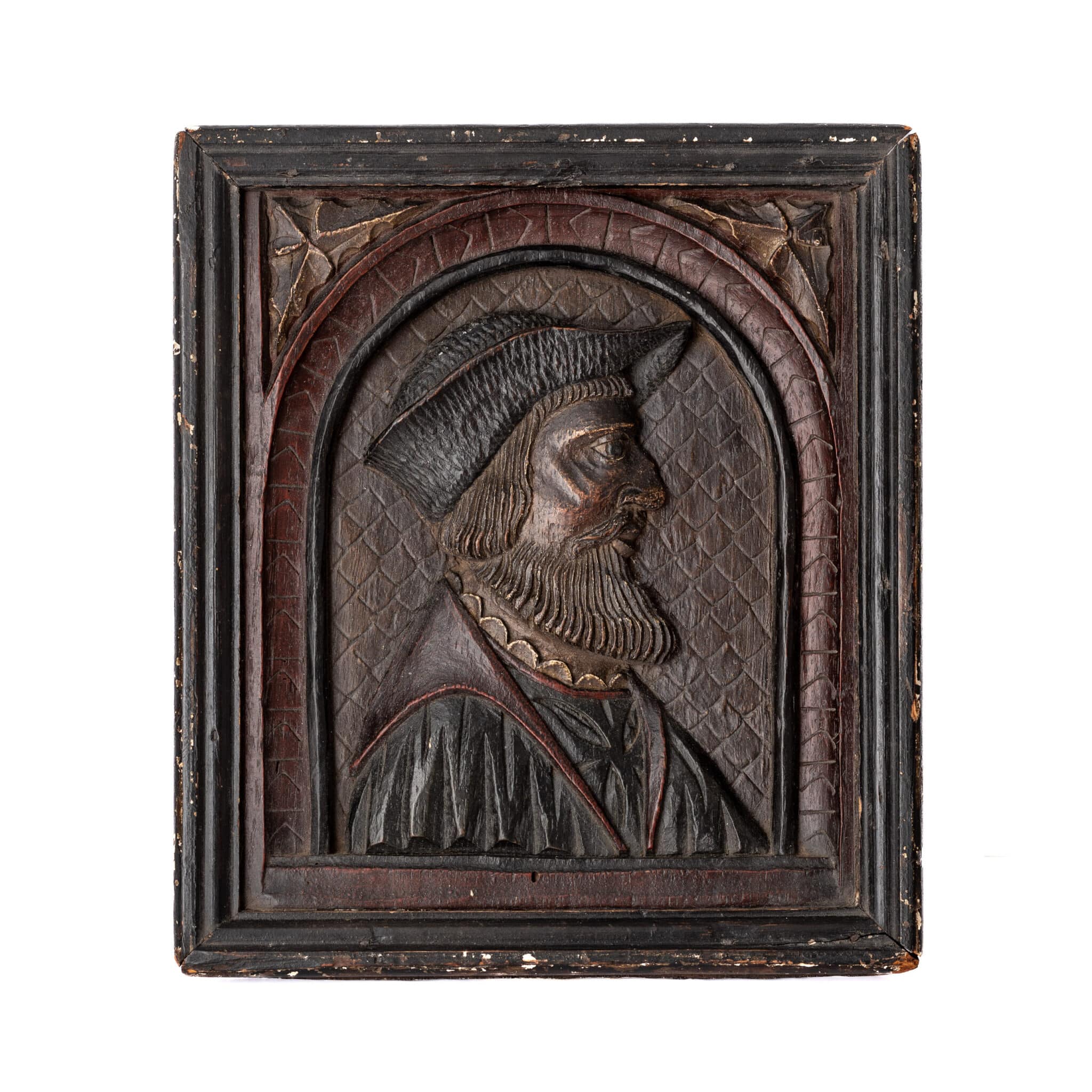 Henry VIII period carved oak portrait panel of a bearded man