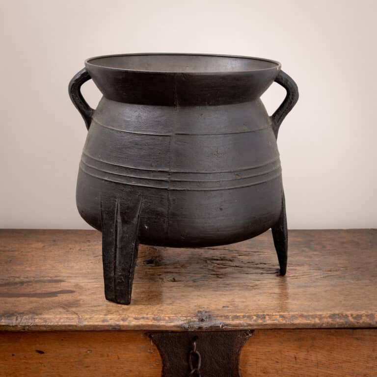 A LARGE LATE MEDIEVAL BRONZE TRIPOD CAULDRON WELSH BORDERS OR SHROPSHIRE LATE 15TH OR EARLY 16TH CENTURY, CIRCA 1450–1525