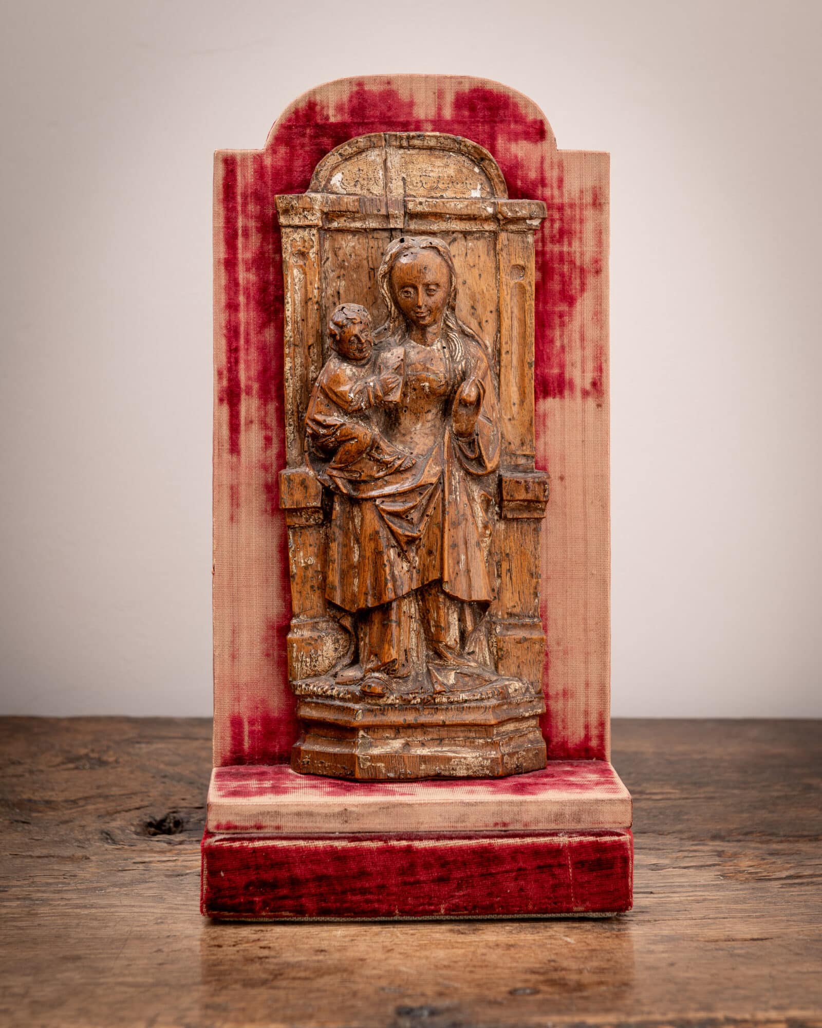 A South Netherlandish Walnut Devotional Sculpture of the Virgin and Child Enthoned