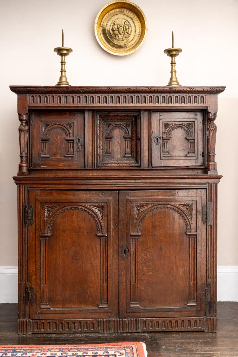 An Important Elizabethan Inlaid and Carved Oak Press Cupboard English, circa 1600 Oak, with contrasting inlay