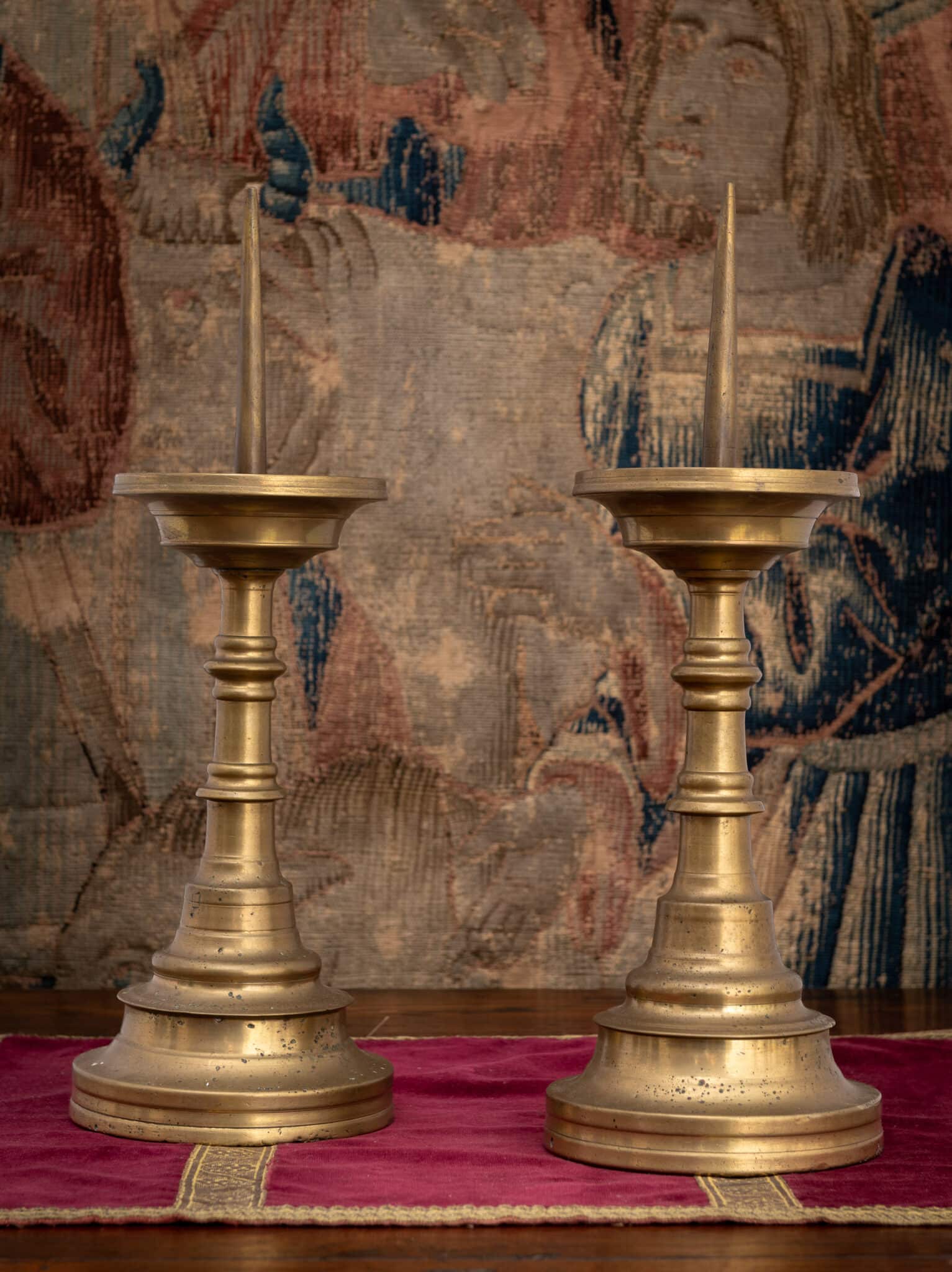 A Pair of Late Gothic Brass Pricket Candlesticks