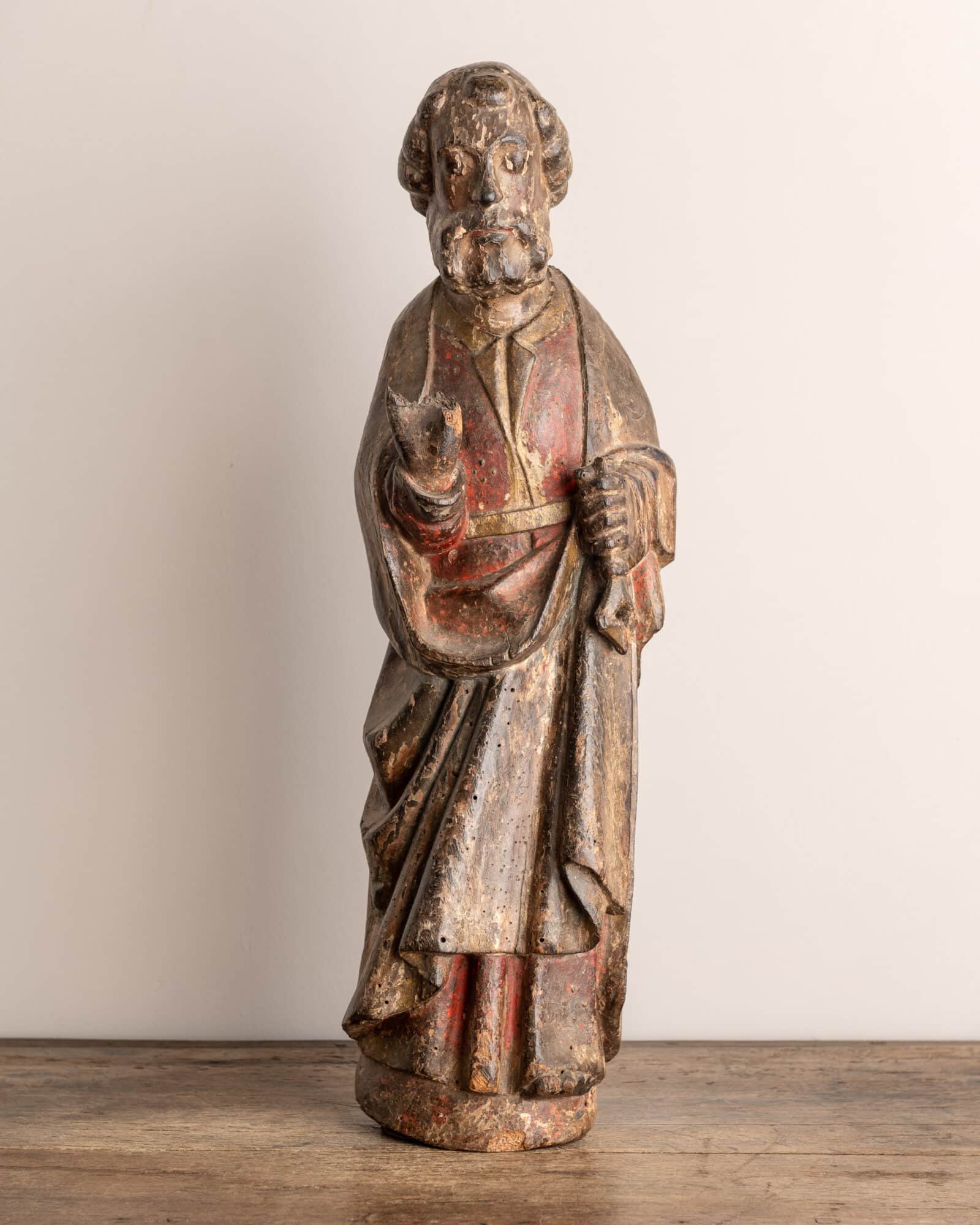 A Gothic Polychrome Walnut Figure of Saint Peter,