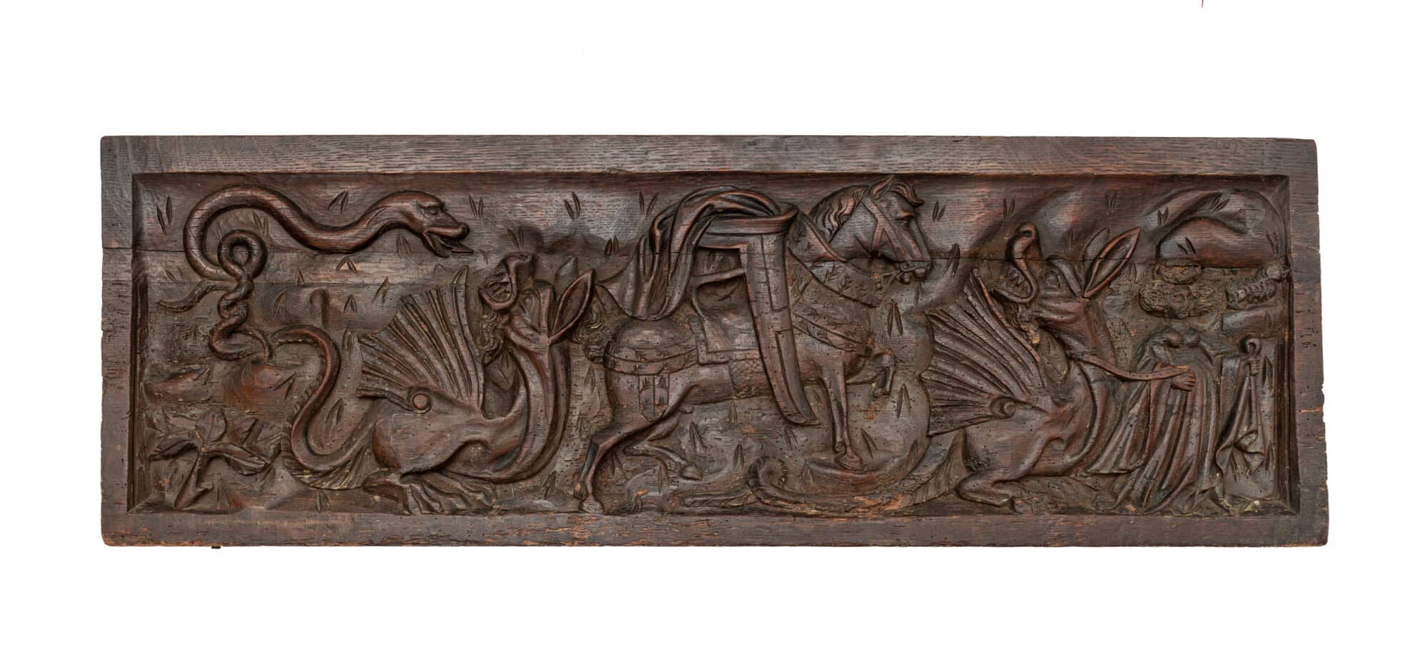 A Mid-Fifteenth-Century Carved Oak Chest Front depicting Saint Margaret of Antioch