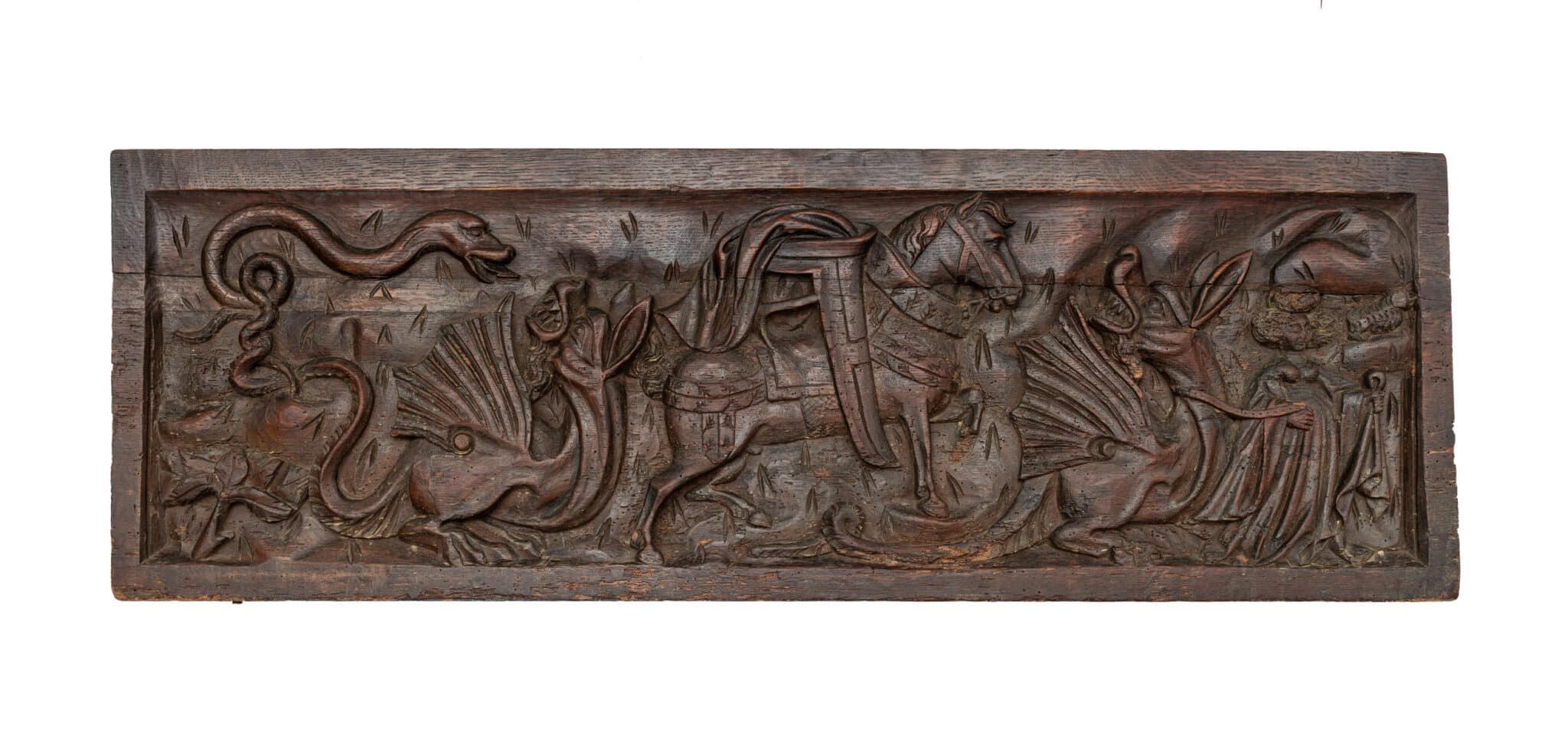 A Mid-Fifteenth-Century Carved Oak Chest Front depicting Saint Margaret of Antioch