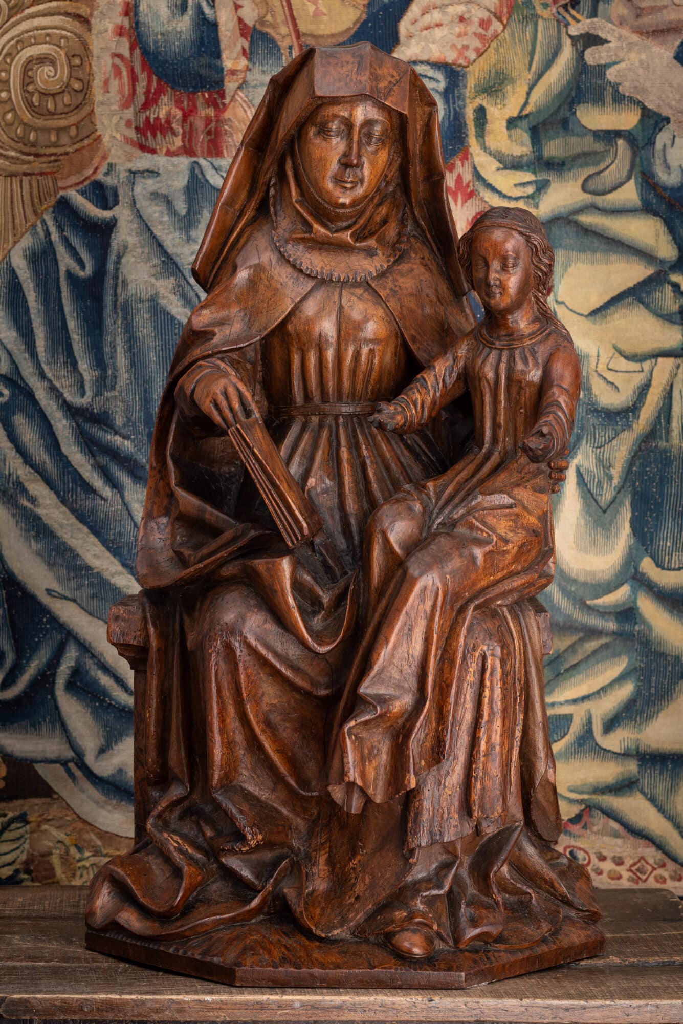 A Monumental Late Gothic Walnut Group of Saint Anne Teaching the Virgin to Read