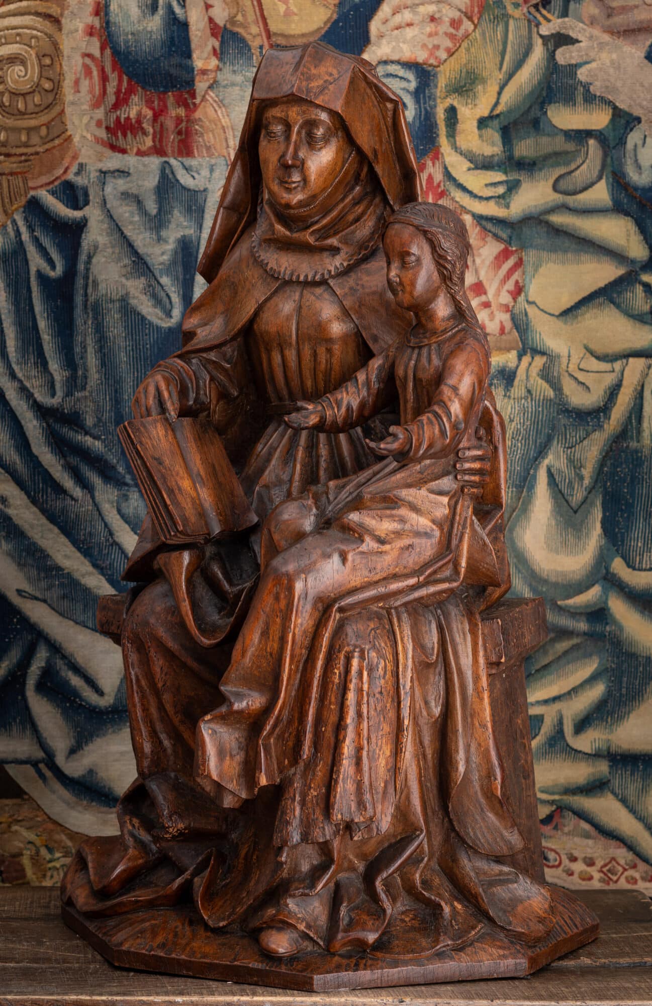 A Monumental Late Gothic Walnut Group of Saint Anne Teaching the Virgin to Read