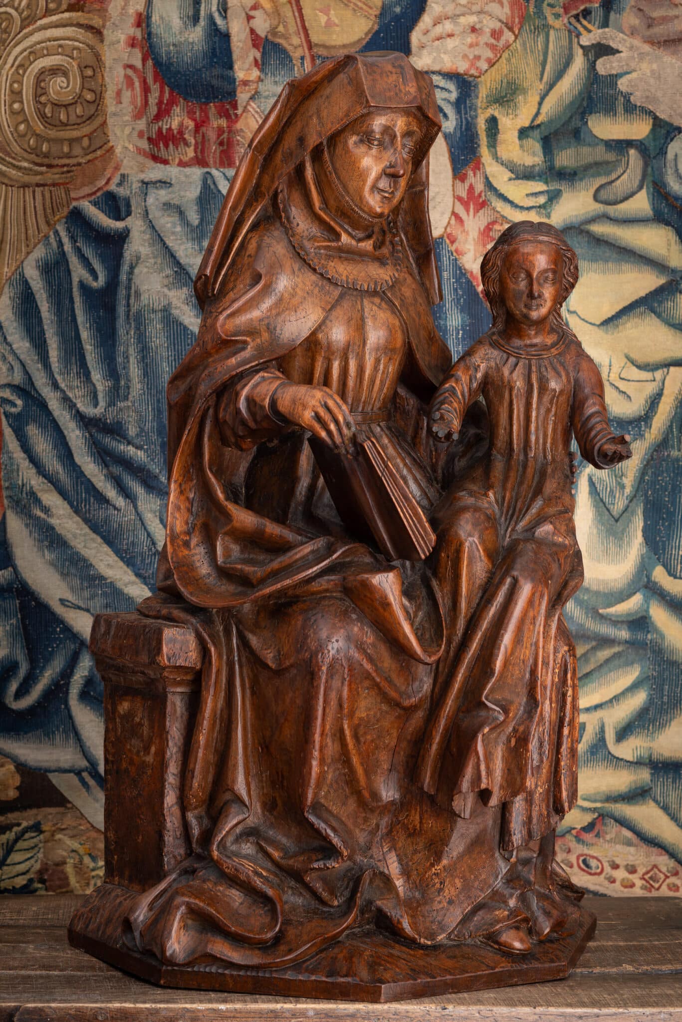 A Monumental Late Gothic Walnut Group of Saint Anne Teaching the Virgin to Read