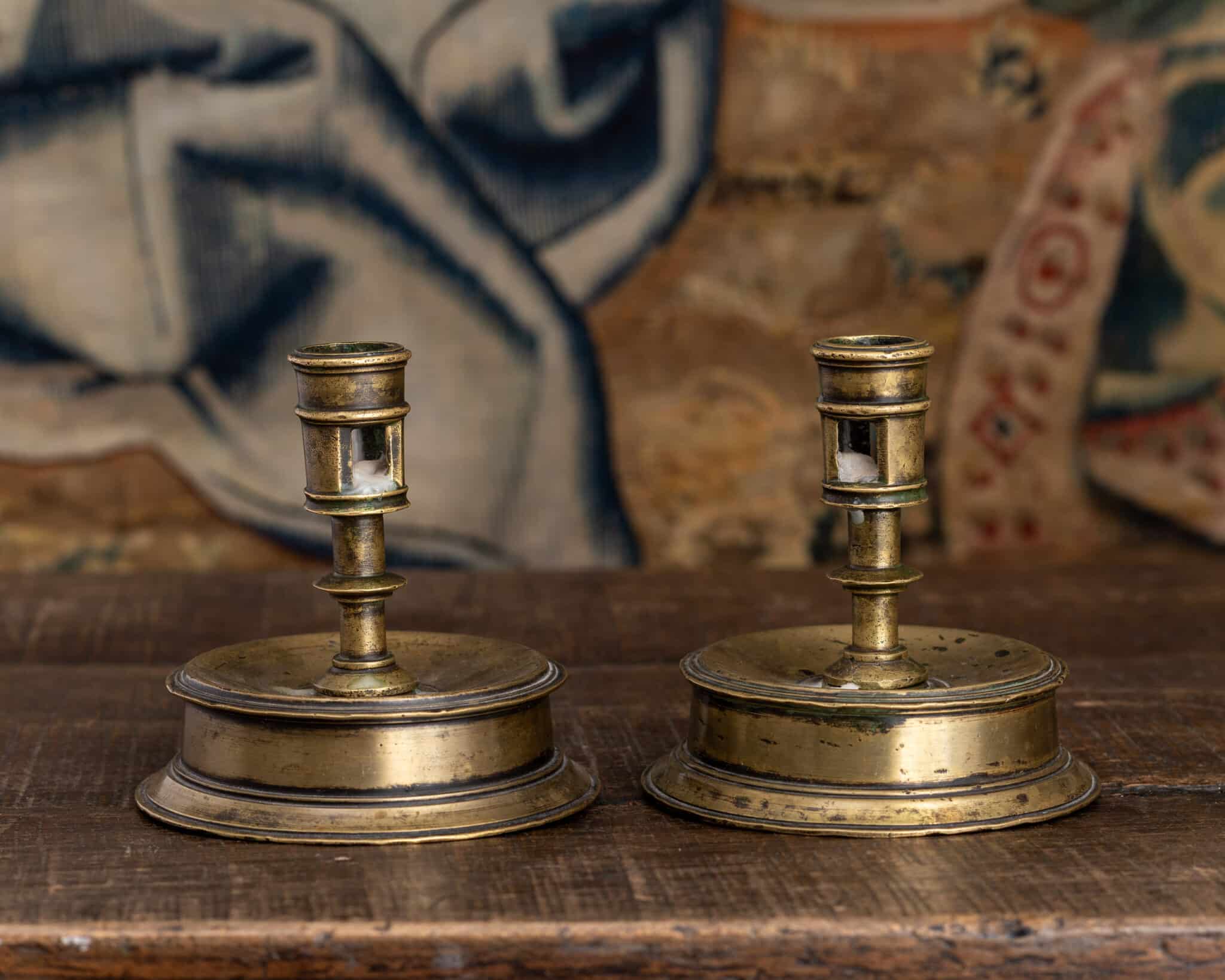 A Pair of Spanish Renaissance Brass Capstan Candlesticks