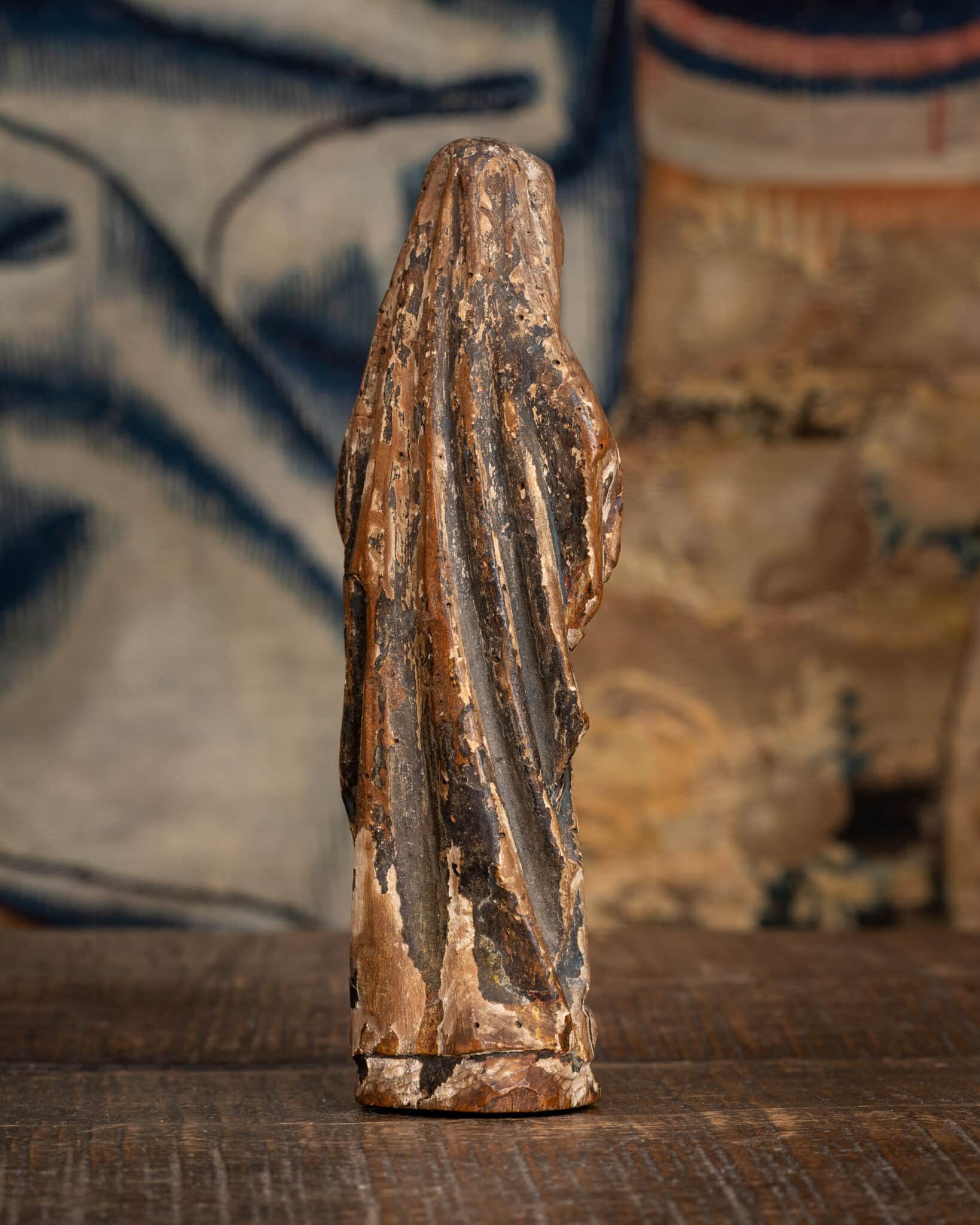 A Miniature Late Gothic Polychromed Sculpture of the Mourning Virgin