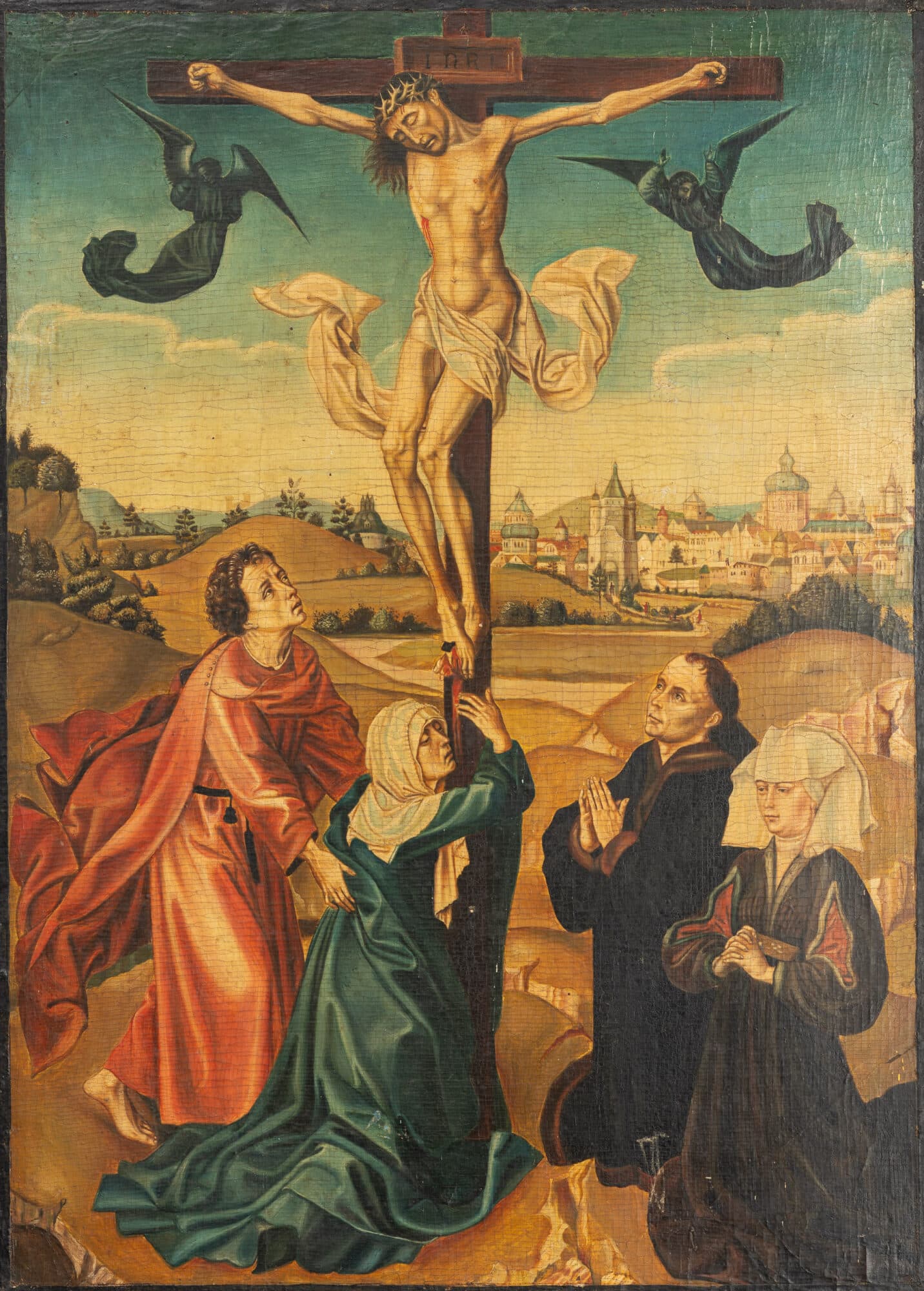 A Late Gothic Netherlandish Panel Depicting the Crucifixion with Kneeling Donors