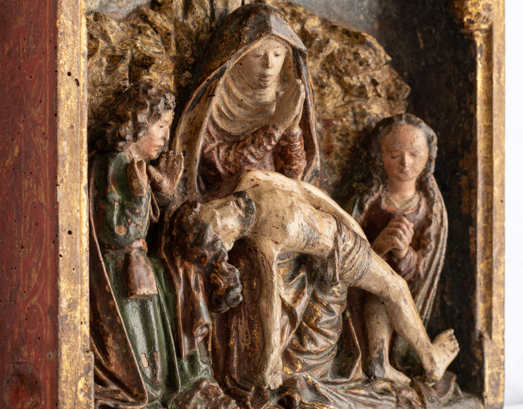A Polychrome and Gilt Oak Relief of the Lamentation of Christ