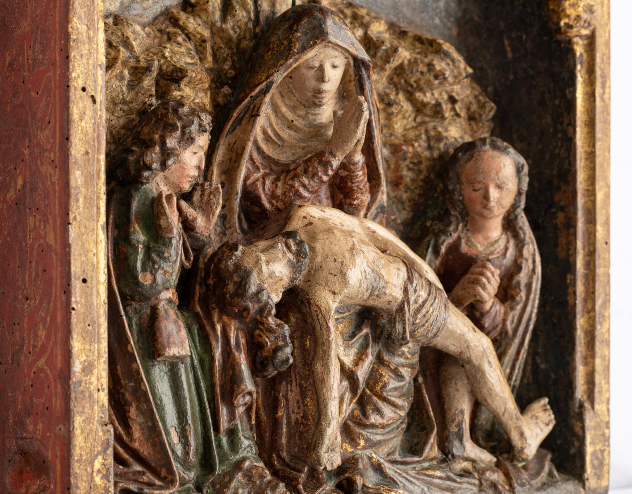 A Polychrome and Gilt Oak Relief of the Lamentation of Christ
